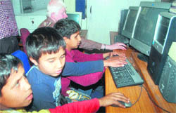 Children at the Institute for Blind, Sector 26, try their hands at computers with the help of JAWS software.