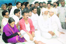 Veteran environmentalist Sunderlal Bahuguna and his wife Vimla Bahuguna with Congress Tehri MLA Kishore Upadhyaya in Dehradun on Thursday.