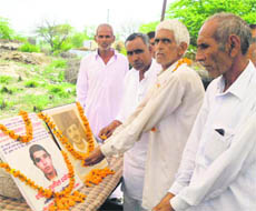 Ironically, the victim, Vijay Singh Karwasra, (second from right), for whom the martyr status is being sought, had on Wednesday paid homage to martyrs. 