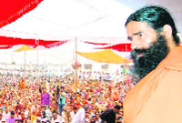 Baba Ramdev addresses a gathering at a function in Jhajjar.