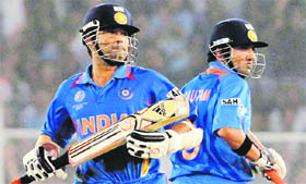 Sachin Tendulkar and Gautam Gambhir hit half centuries during the quarterfinal tie against Australia at Motera on Thursday.
