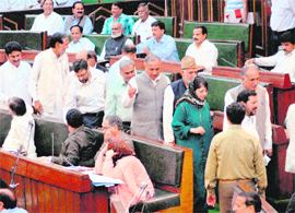 Led by their leader Mehbooba Mufti, PDP legislators stage a walkout from the Legislative Assembly in Jammu on Thursday