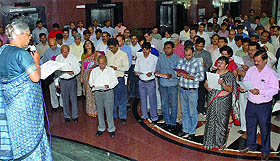 Chief Minister of Delhi Sheila Dikshit administers oath to officials of the state secretariat on the eve of World Earth Day in New Delhi on Friday.