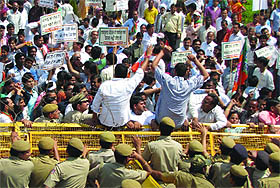 BJP activists protest against the Delhi government near the Assembly in New Delhi on Friday.