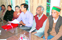 Vishal Sharma of the Pandit Deen Dayal Upadhyaya Sewa Pratishthan addresses a press conference at Mussoorie on Friday