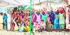 Jat women activists hold a protest on the railway track at Gajuwala in Fatehabad on Friday.