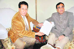 Minister for Youth Services and Sports RS Chib (left) with Union Minister for Youth Affairs and Sports Ajay Maken in Srinagar on Friday.