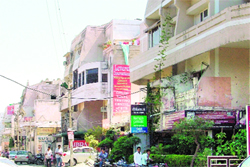 HIG residential houses in Sant Isher Nagar being used for commercial activities in Ludhiana.