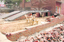 Construction under way on land that has been occupied illegally near CRPF Colony in Ludhiana.