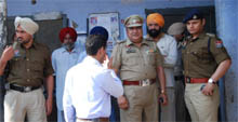 Police enquiring at the spot where the cash was allegedly stolen from the PRTC workshop on Saturday. 