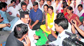 Uttarakhand Education Minister Govind Singh Bisht talks to BTC agitationists in Dehradun on Saturday.