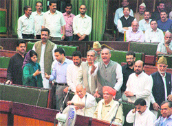 Legislators of the PDP stage a walkout from the Legislative Assembly in