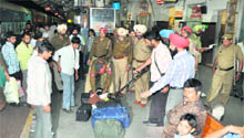 Bags being checked at the Ludhiana railway station in the wee hours of Saturday. 