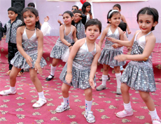 Tiny-tots of Daddys Teddy, a playway school in Bathinda, present a dance item during the annual day function on Sunday