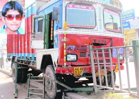 The truck that claimed the life of Gurvinder Singh (inset) on the Chandigarh-Ambala highway at Dera Bassi