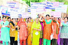 Women hold an awareness rally in Haridwar on Sunday.