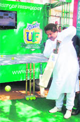 Crick-hit in politics too: J&K Revenue Minister Raman Bhalla tries his hand at batting while inaugurating a cricket tournament in Jammu.