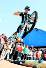 Daniel Rall, a German stunt man, performs during the Bikes Expo in Ludhiana on Sunday