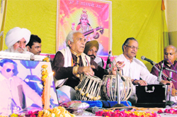 Artistes perform during the 10th Shastriya Sangeet Sammelan organised at Pushpa Devi Aggarwal Bhawan in Ludhiana on Sunday