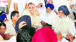 Chief Minister Parkash Singh Badal during a Sangat Darshan programme in Mehta village, Amritsar, on Sunday