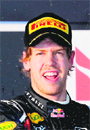 Sebastian Vettel celebrates on the podium