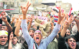 Anti-government protesters demonstrate demanding ouster of President Ali Abdullah Saleh in Sanaa on Sunday.