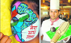 FACE OF INDIA: A young fan getting her face painted with patriotic colours and slogans ahead of the match. (Right) SHOW OFF: Sandeep Bansal, chef at Hotel Mountview, shows a specially baked cake in the shape of a bat and ball.