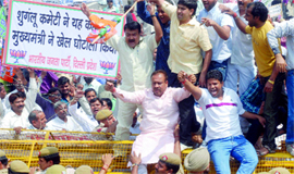 BJP activists hold a demonstration demanding removal of Chief Minister Sheila Dikshit in the wake of the Shunglu Committee report on the Commonwealth Games, at Vidhan Sabha in New Delhi on Monday.