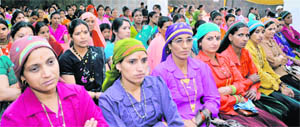 Women participants at a seminar on domestic violence in Dehradun on Monday.