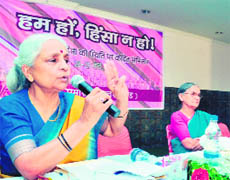   Jaya Srivastav, social activist, makes a point at a seminar in Dehradun on Monday.
