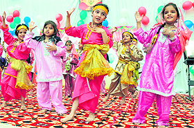 Kids of OPS Vidya Mandir perform during a cultural event of the school in Karnal on Monday.