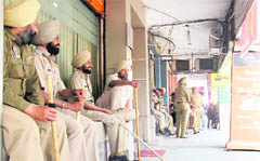 Punjab Police personnel take over a market in Phase X around the PCA Stadium, badly affecting business activity. 