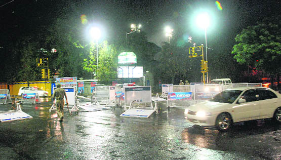 The security barricades went for a toss following the rain outside the PCA Stadium ahead of the semifinal match between India and Pakistan