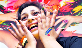 An ecstatic fan with her nails and hands painted with the Tricolour in Ludhiana on Tuesday.