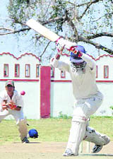 A batsman plays the shot in the 59th District Cricket League at the Survey of India Stadium in Dehradun on Wednesday. 