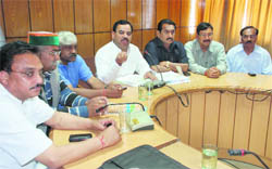 Leader of the Opposition Harak Singh Rawat addresses a press conference in Dehradun