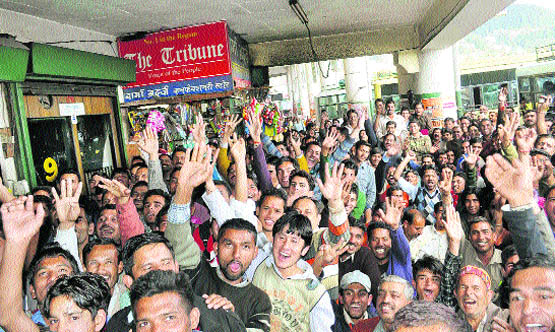 People watch the World Cup cricket semifinal match between India and Pakistan in Shimla
