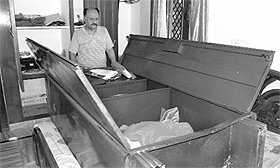 The owner examines his house that was ransacked by thieves at Sector 25 in Panchkula on Thursday.