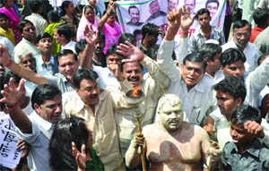 BJP activists demonstrate at Jantar Mantar in New Delhi on Thursday.