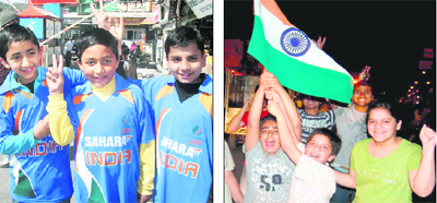 Children flash victory signs at Mussoorie and (right) wave the Tricolour in Haridwar