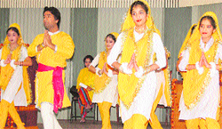 Students perform a dance during a function of Aakash Education Institute in Jammu on Thursday