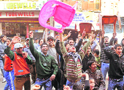 Cricket fans celebrate the Indian cricket teams victory over Pakistan in World Cup semifinal match