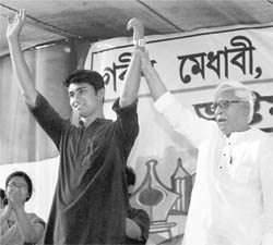 West Bengal Chief Minister Buddhadeb Bhattacharjee introduces his partys youngest candidate Swatarup Ghosh in Kolkata on Thursday.