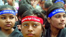 Children take part in a rally calling for the implemention of compulsory education for all children between the ages of 6 and 14, at Jantar Mantar, in New Delhi on Friday