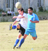 A match of the Vir Singh Memorial Football Tournament in progress in Dehradun on Friday.