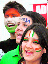 Cricket fans in Jammu cheer for Team India on Friday.