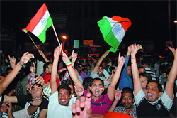 People celebrate as India lift the World Cup-2011, at Fire Brigade Chowk in Bathinda on Saturday