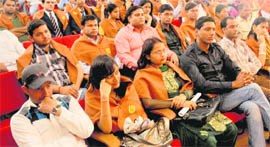 IGNOU students watch the convocation address from New Delhi on TV on the Panjab University campus, Chandigah, on Saturday.