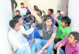Students of Postgraduate Government College, Sector 11, stage a dharna outside their principal’s office in Chandigarh on Saturday.