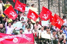 Activists of the CPM raise slogans in Shimla